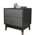 Black bedside table with two drawers and gold-coloured handles
