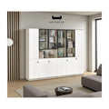 Wide white and grey book cabinet with glazed upper doors in a room