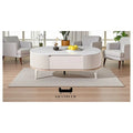 Pale oval coffee table, front view in a living room