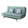 Teal tufted sofa bed with patterned cushions