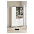 White and grey book cabinet with glazed upper doors beside a window
