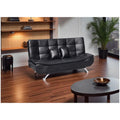 Black tufted sofa bed in a living room