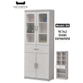 Grey book cabinet with glazed doors and central drawer