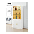 White cabinet with gold-coloured display section in a living room