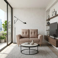Beige Kova sofa beneath a black wall lamp