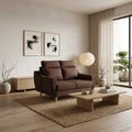 Brown Freya sofa beside a low wood coffee table