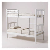 White wooden bunk bed with side ladder and bedding