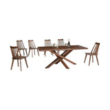 Walnut dining table with crossed base and six spindle-back chairs