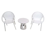 White woven-look chairs with matching round side table