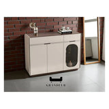 Beige side cabinet with oval glass inset in a door