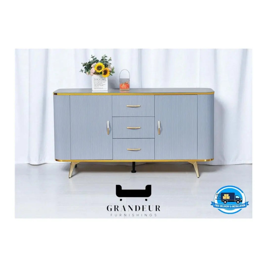 Stylish Blue Ribbed Side Cabinet with Gold Accents and Tempered Glass Top Grandeur Furnishings