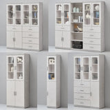 Light grey book cabinets with glazed doors in several configurations