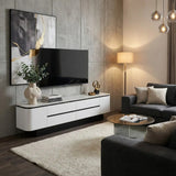 White Monarc TV console with black horizontal accents in a living room