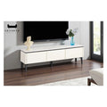 White TV console beneath a wall-mounted television