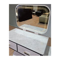 Rounded rectangular vanity mirror with illuminated dotted border, close-up