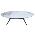 Oval stone-patterned coffee table with black splayed legs