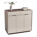 Narrow beige shoe cabinet with dark base and upper drawers
