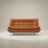 Orange tufted sofa bed with curved metal legs, front view