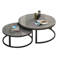 Dark stone-patterned nesting coffee tables with black circular bases