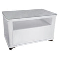 White coffee table with grey top, open shelf and lower drawer