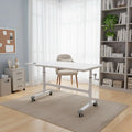 White height-adjustable desk on wheels in a bright room
