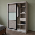Alden wardrobe partly open to show hanging space, shelves and a drawer