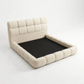 Cream Cadenza bed frame with bare platform, angled front view
