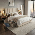 Person opening a storage drawer beneath cream Meridiem bed