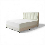 Cream Mirage upholstered bed with padded wingback headboard