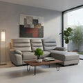 Grey L-shaped sofa beside a coffee table in a living room