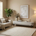 White Vantor TV console beneath framed artwork