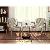 Khaki slatted chairs with matching square side table beside a window