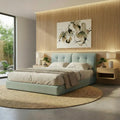 Pale blue Novelle bed beneath framed artwork