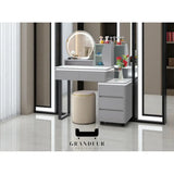 Grey dressing table with illuminated round mirror and cylindrical stool