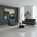 Dark grey sofas in a bright living room