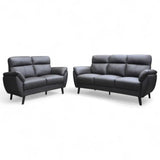 Dark grey two-seater and three-seater sofas with padded backrests
